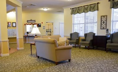 Bright common area with seating and decorative elements