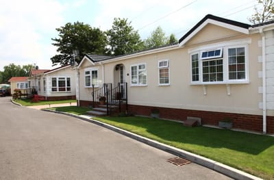 Exterior view of residential units in a park setting