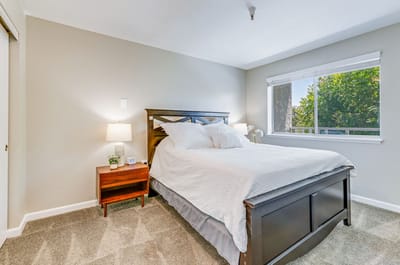 Cozy bedroom with a bed and window view