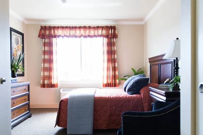 Comfortable private room with a large window