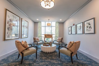 Bright common area with comfortable seating and decor