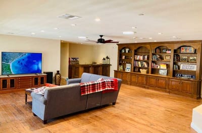 Interior view of a common area with seating and entertainment