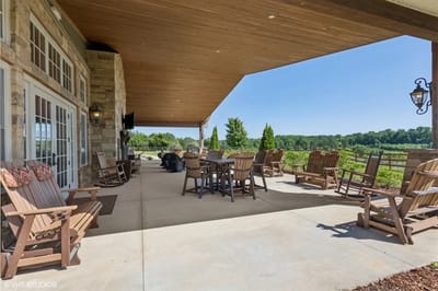 Outdoor patio area with seating and views