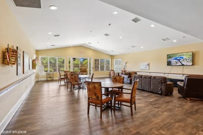 A bright and spacious common area with seating