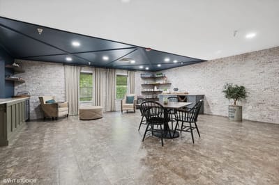 Bright common area with seating and décor