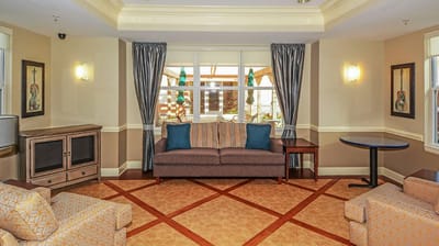 Bright common area with comfortable seating and natural light
