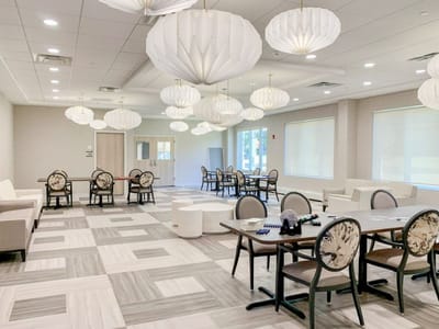 Common area with modern furnishings and lighting