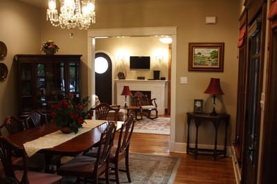 Warm dining room with elegant decor and furniture