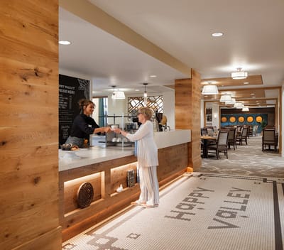 Residents enjoying coffee at a cozy common area