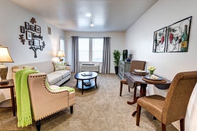 Cozy resident room with seating and decor