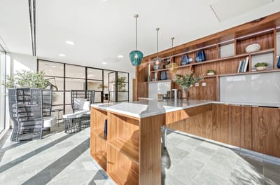 Bright, modern common area with seating and decor