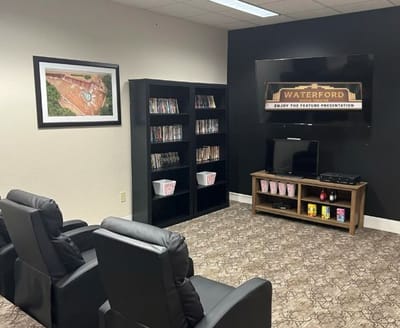 Cozy common area with seating and media options