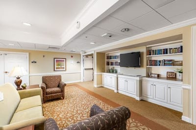 Common area in a cozy living room with bookshelves