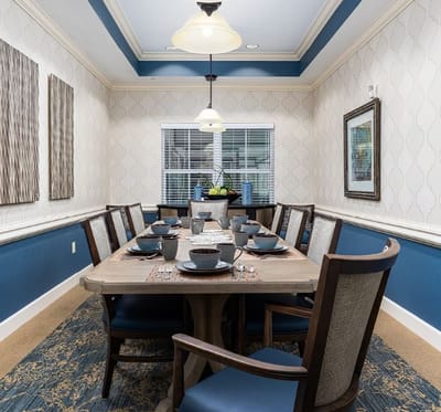 Dining room set up for a meal at the facility