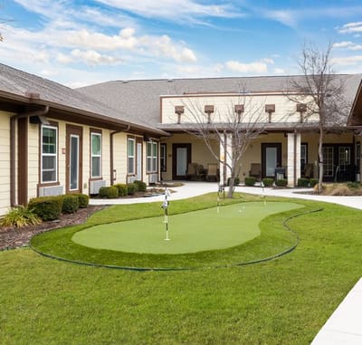 Outdoor putting green in a senior living facility