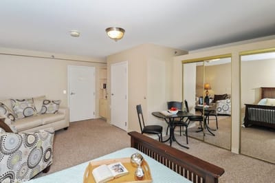 Interior view of a cozy resident room with furnishings