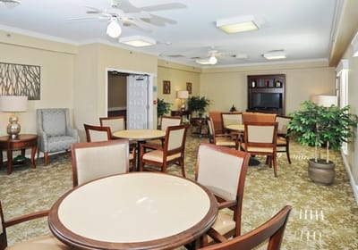 Bright common area with tables and chairs