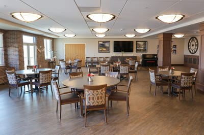 Bright dining room with tables and chairs
