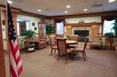 Common area with seating and a decorative fireplace