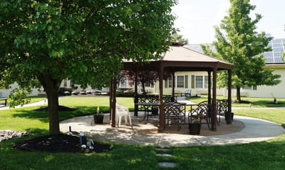 A gazebo in a well-maintained garden area