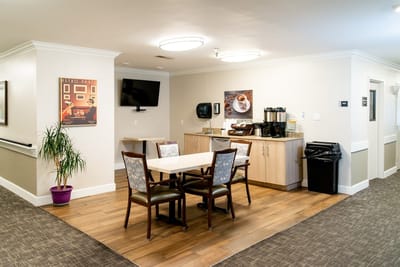 Interior common area with seating and coffee station