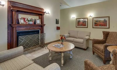 Welcoming lounge area with seating and fireplace