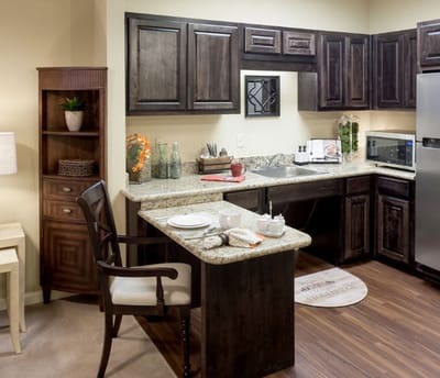 Interior view of a kitchenette with modern appliances