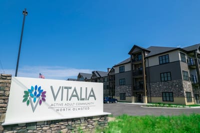 Exterior view of Vitalia Active Adult Community sign and building