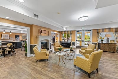 Common area with seating and a fireplace
