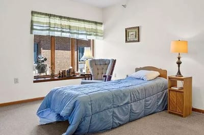Cozy bedroom setup in a senior living facility