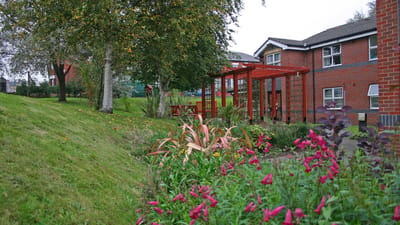 Well-maintained garden space with flowers and architecture