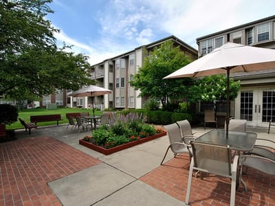 Outdoor courtyard with seating and landscaping