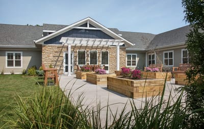 Exterior view of the facility with a garden area