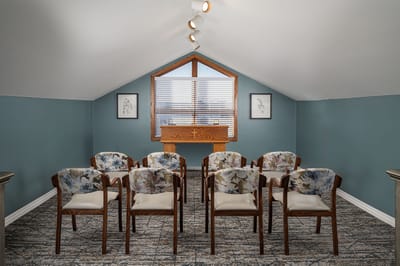 Interior view of a chapel with chairs and altar