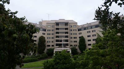 Exterior view of Willamette View facility surrounded by greenery