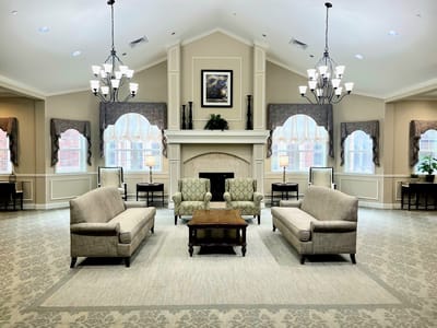 Common area with seating and decorative lighting