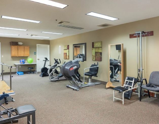 Interior view of a fitness area with exercise equipment
