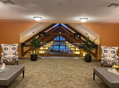 Interior view of a bright common area with seating