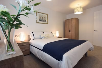 Private resident room with bedding and decor