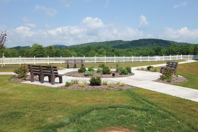 Outdoor seating area with benches and pathways