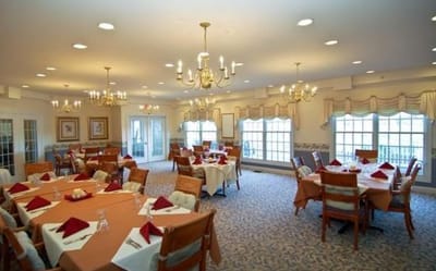 Dining room set up for a meal with elegant decor