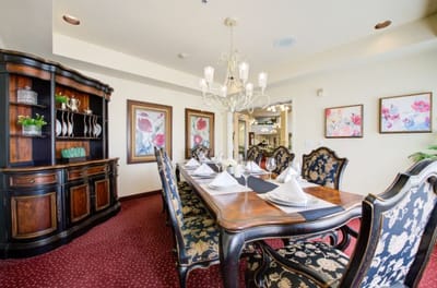 Elegant dining room setup with ornate furniture