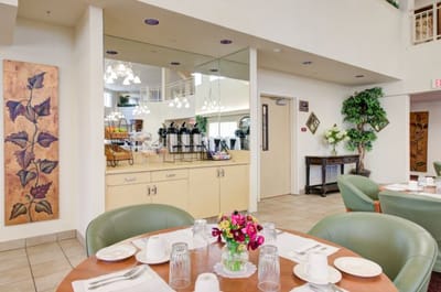 Dining area with tables set for a meal