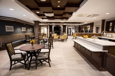 Bright common area with tables and chairs