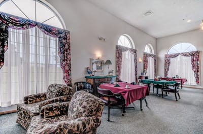 Bright common area with floral decor and seating