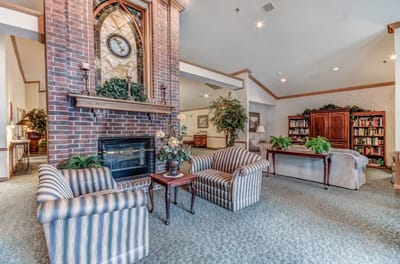 Cozy common area with comfortable seating and a fireplace