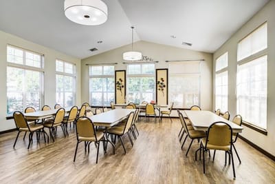 Bright common area with tables and chairs