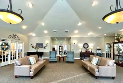 Interior common area with seating and piano
