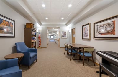 Interior hallway with seating and artwork