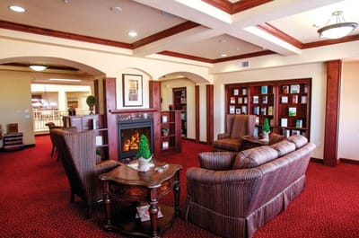 Cozy common area with seating and a fireplace